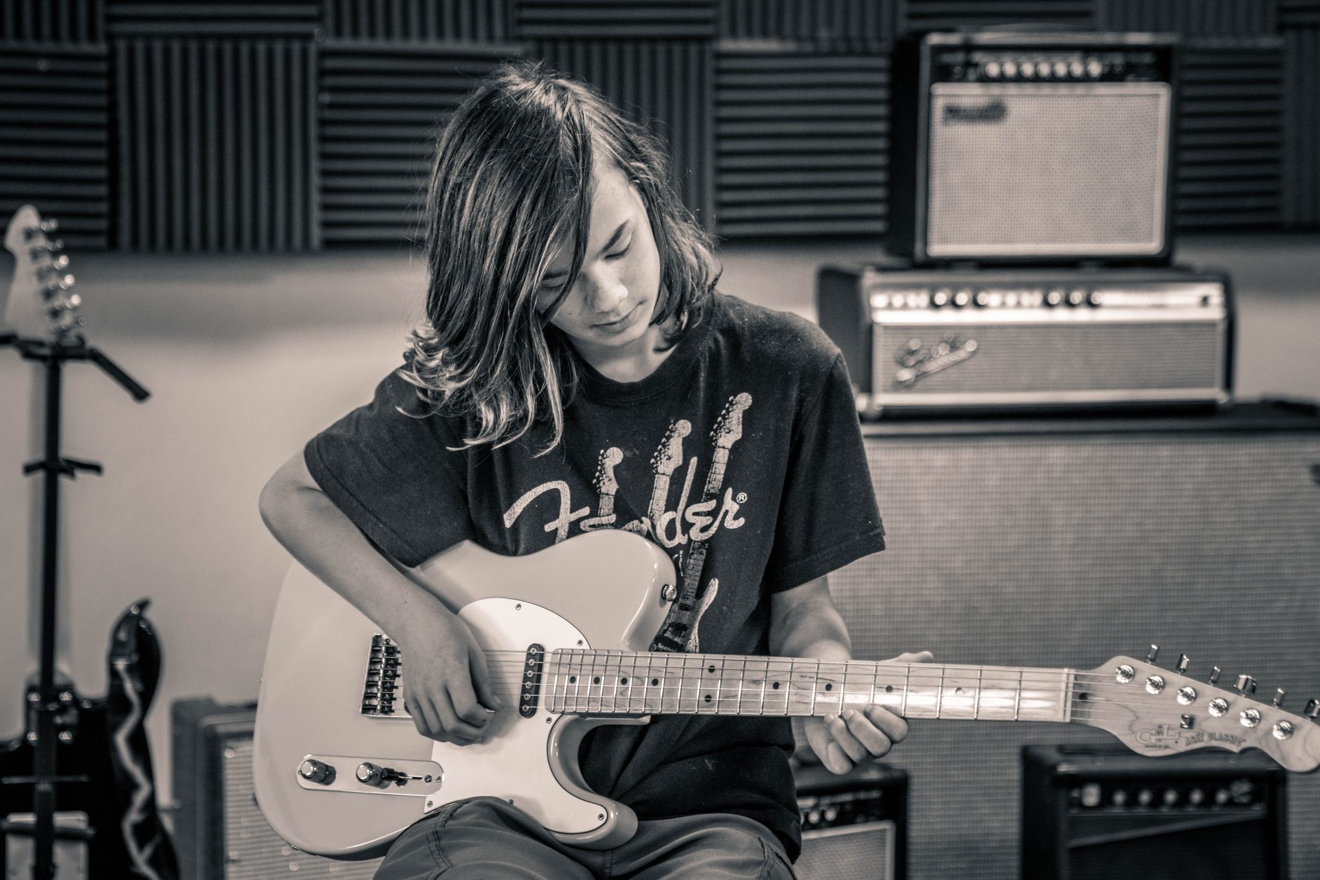 Student taking a guitar lesson in Oklahoma City